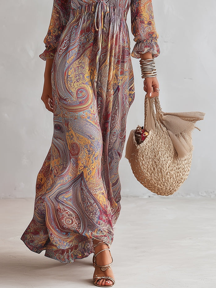 Vestido largo de gasa con elegante estampado paisley, escote en V y refinados detalles fruncidos