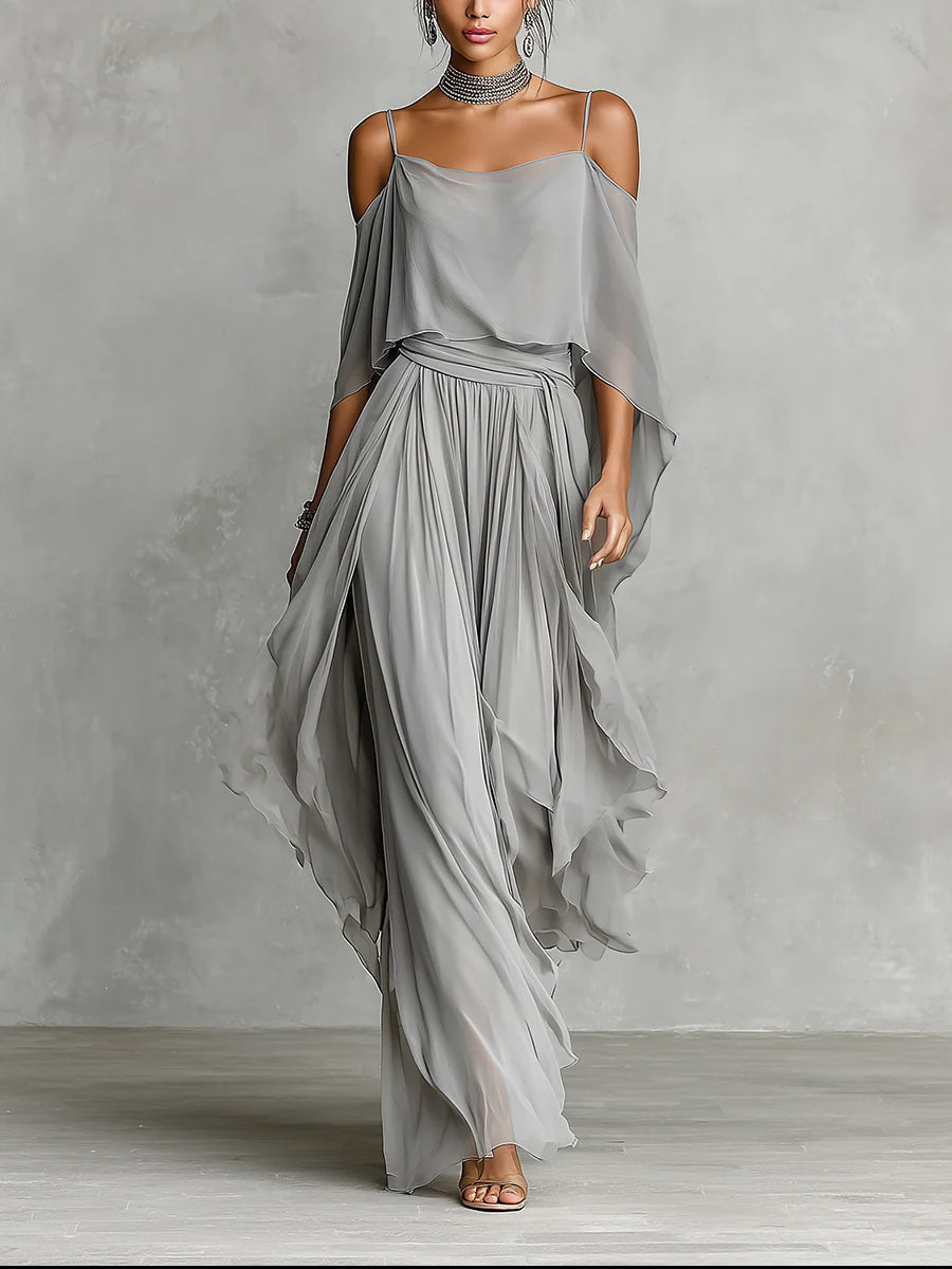 Elegante conjunto coordinado de gasa gris con top drapeado y pantalones a juego