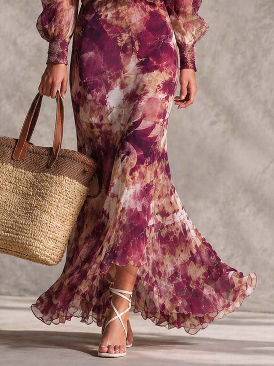Elegante vestido largo de gasa floral en rosa empolvado con hombros descubiertos