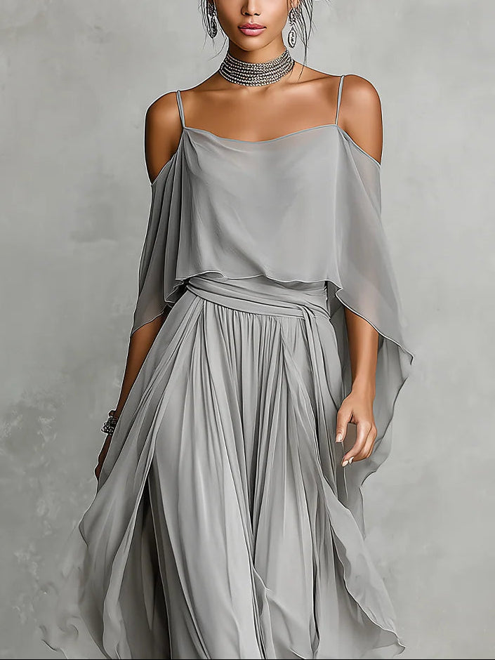 Elegante conjunto coordinado de gasa gris con top drapeado y pantalones a juego