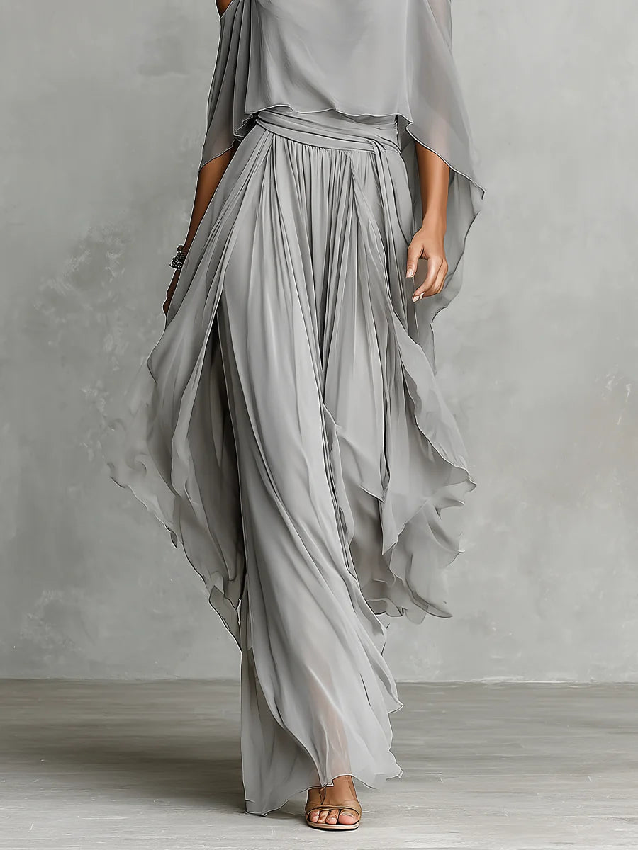 Elegante conjunto coordinado de gasa gris con top drapeado y pantalones a juego