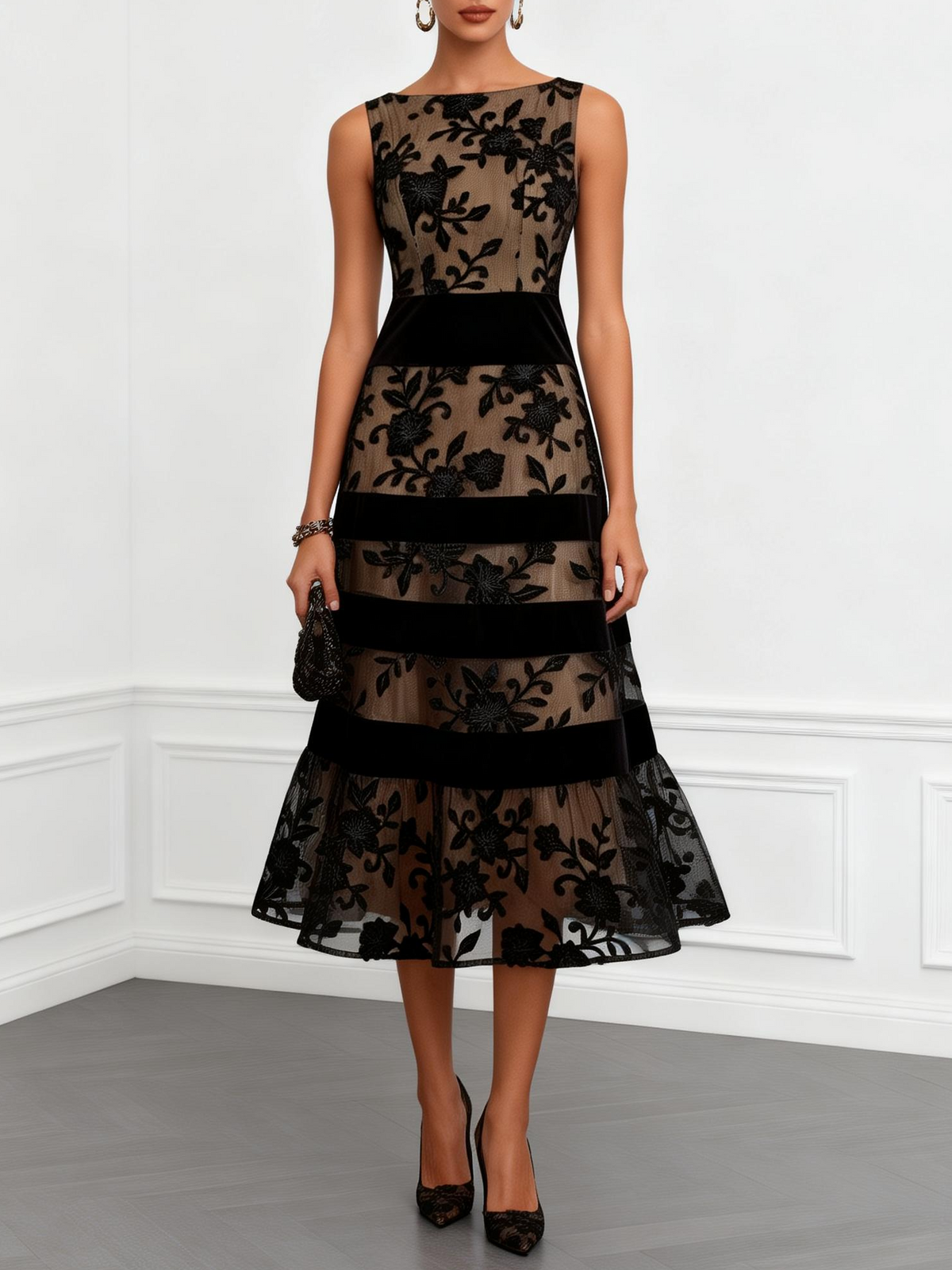 Elegante vestido negro , sin mangas y con sofisticado motivo floral de malla