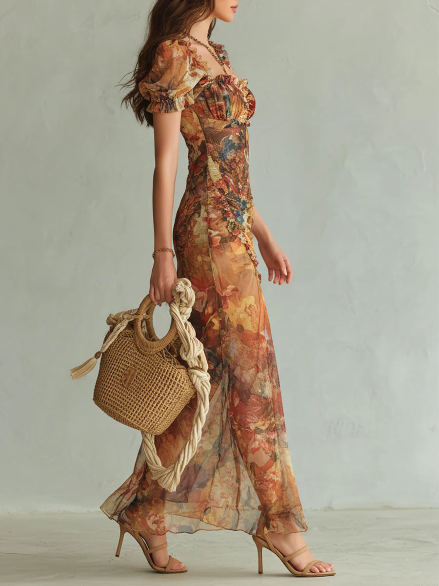 Vestido largo bohemio de gasa naranja con elegante estampado artístico al óleo, perfecto para las vacaciones