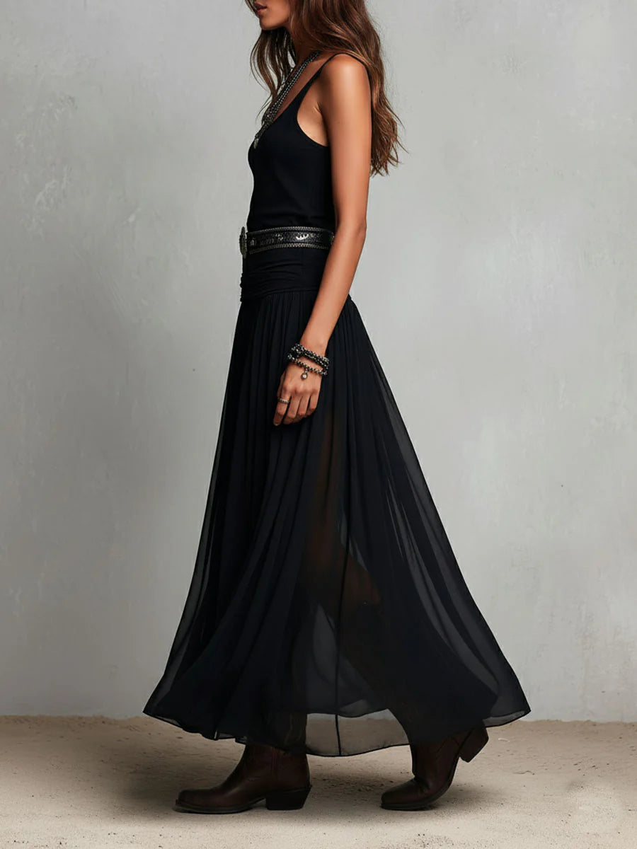 Vestido maxi largo negro con top sin mangas, falda de tul y cinturón elegante