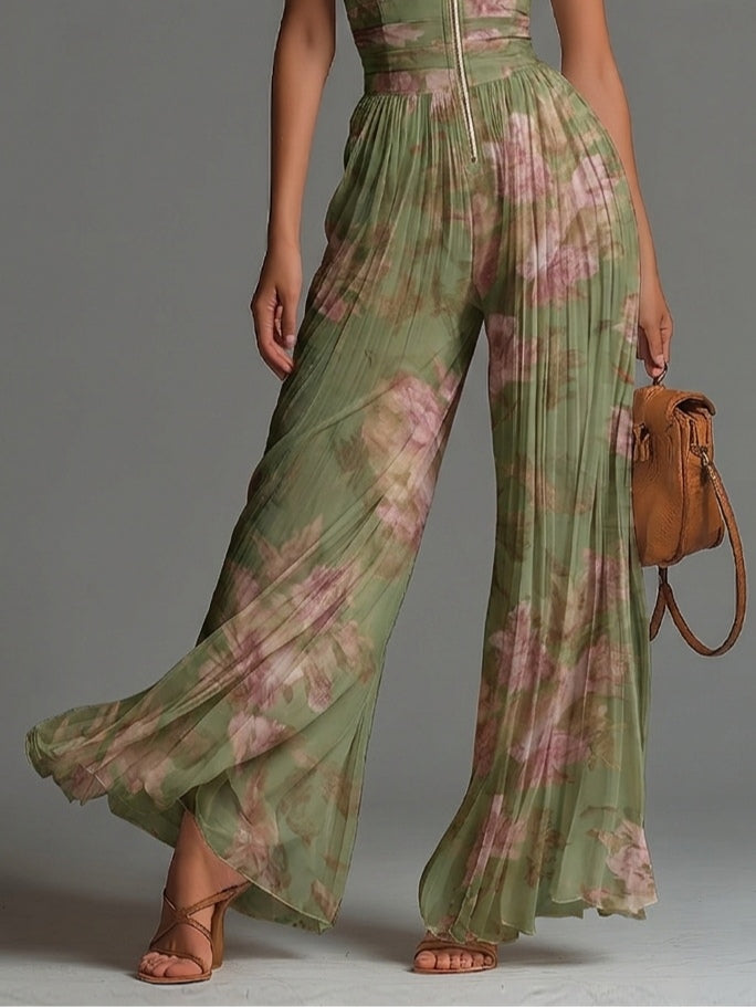 Elegante mono palazzo de gasa verde con estampado floral, escote en V, sin mangas, cierre de cremallera y sofisticados detalles plisados