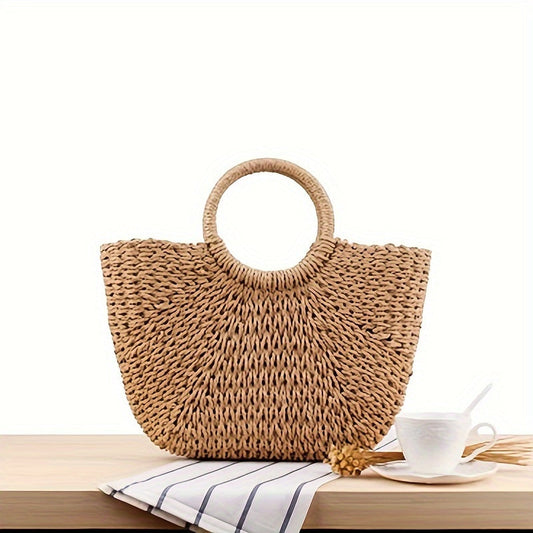 Serenella | Bolso de media luna de paja trenzada color coñac, elegante y refinado